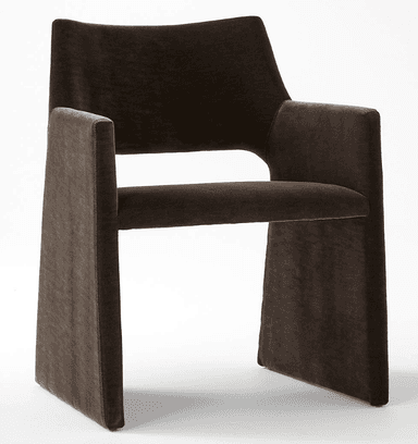 A dark brown fully upholstered armchair featuring a modern, monolithic design. The chair has a wide, slightly curved backrest, integrated armrests, and a sturdy, block-like base, all seamlessly covered in a plush, velvet-like fabric. — 3D model