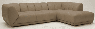 An L-shaped sectional sofa with tan upholstery, featuring individual segmented backrests and seat cushions, and an integrated chaise lounge on one end. It has a low-profile design. — 3D model