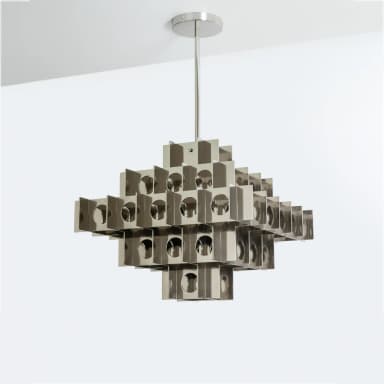 A modern chandelier featuring a modular, geometric design. The fixture is constructed from numerous rectangular and triangular metal elements arranged in overlapping layers, creating a complex, three-dimensional lattice structure. Circular cutouts are present within some of the rectangular panels, allowing light to pass through. The reflective surface gives it a metallic sheen. — 3D model
