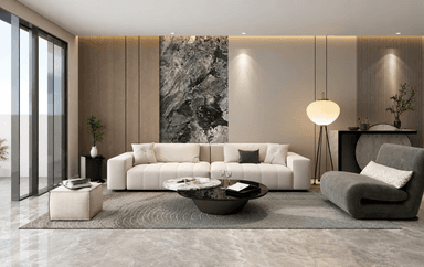A light-colored, contemporary modular sectional sofa is depicted, consisting of multiple units arranged in a linear configuration. The sofa features low backrests, wide, integrated armrests, and subtly tufted seat and back cushions. It is upholstered in a neutral, possibly beige or cream-toned, fabric and accessorized with a few accent pillows, including one dark green cushion. — 3D model