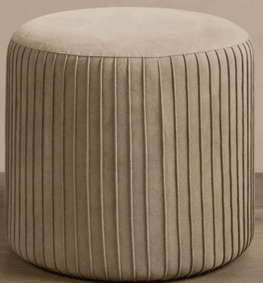 A contemporary cylindrical ottoman featuring a fully upholstered design with a smooth, rounded top surface and vertically fluted sides. The piece is rendered in a neutral beige or taupe fabric, presenting a clean and versatile aesthetic. — 3D model