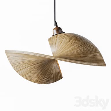 A pendant light fixture featuring an abstract, sculpted shade composed of layered, thin strips resembling wood veneer or a similar natural material. The shade has a dynamic, flowing form with a visible inner core. It is suspended by a dark fabric-covered cord attached to a metallic, antique-finish ceiling canopy. — 3D model