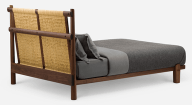 A loveseat seen from the back, featuring a dark walnut wood frame and a light-colored woven natural fiber backrest. The frame is composed of horizontal and vertical wooden members, within which two distinct woven panels are secured. A dark gray cushion is partially visible through the woven material. — 3D model