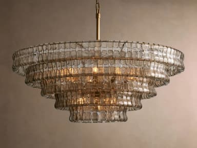 A multi-tiered chandelier with a tiered, cascading design. The fixture features numerous individual rectangular glass elements that are strung together to form stacked, curved tiers. The glass appears textured and semi-transparent, allowing light to diffuse through it. A central golden chain suspends the fixture. — 3D model