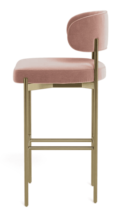 A modern bar stool featuring a rounded upholstered backrest and a padded seat cushion, both covered in a dusty rose velvet fabric. The frame is constructed from slender, tubular metal with a golden or brass finish, incorporating an integrated rectangular footrest. The design is sleek and minimalist, suitable for contemporary interiors. — 3D model