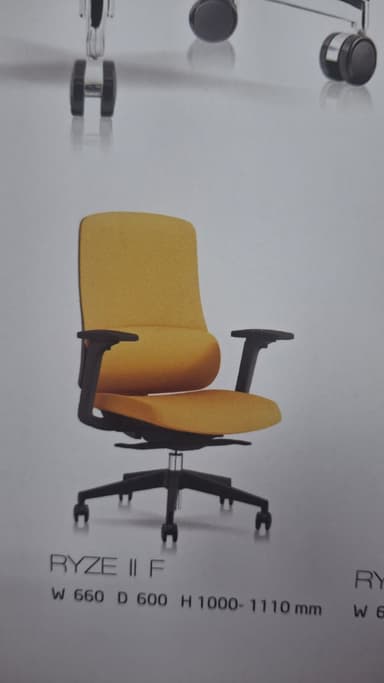 An ergonomic office chair featuring a padded seat and backrest upholstered in a textured yellow/gold fabric. The chair is supported by a black five-star wheeled base with dual casters, and it includes height-adjustable T-shaped armrests made of black plastic or metal. The design is modern and functional, suitable for a professional or home office environment. — 3D model