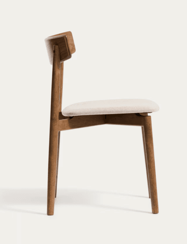 A modern dining chair featuring a solid wood frame with a curved wooden backrest and an upholstered seat. The chair exhibits clean lines and a minimalist design. — 3D model