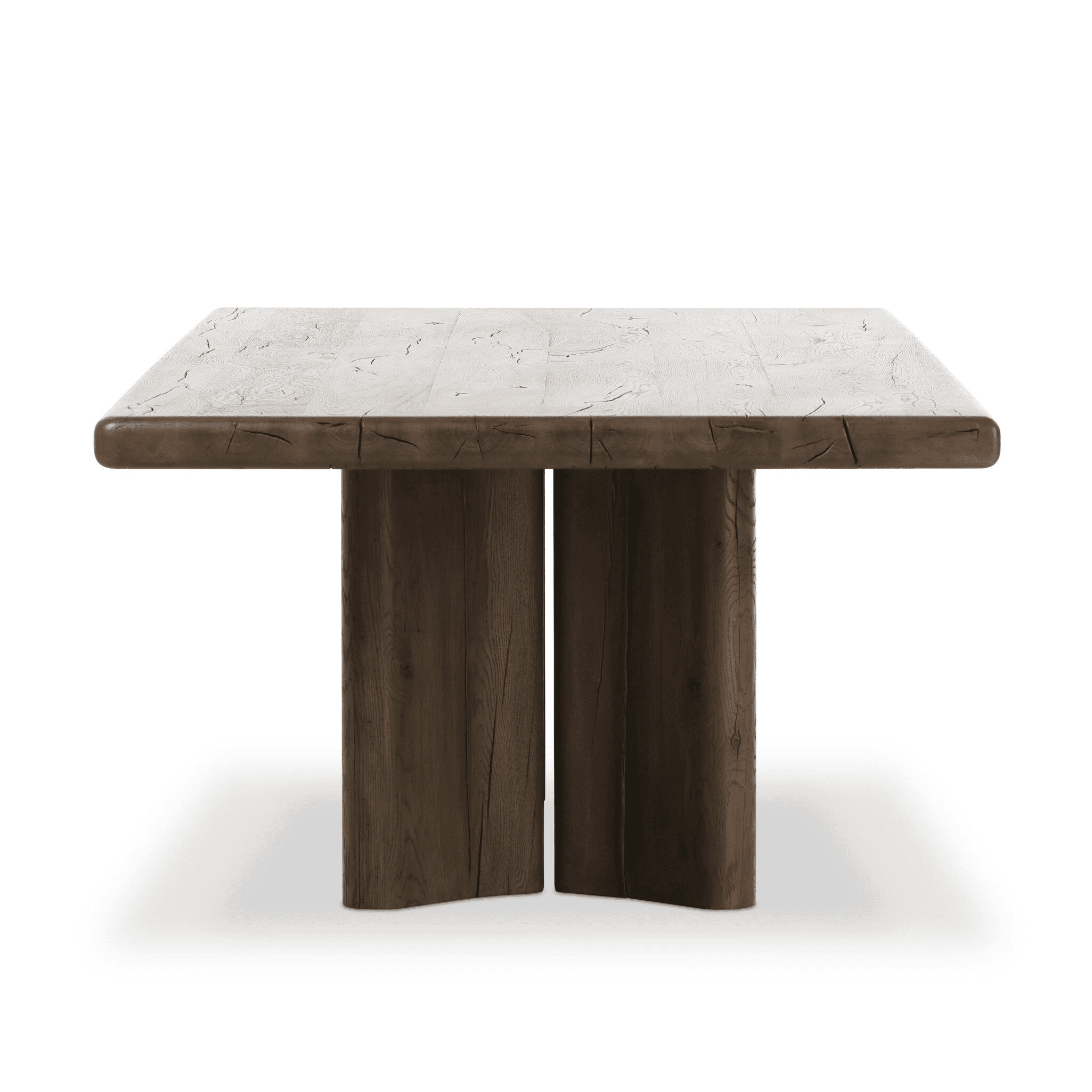 A rectangular dining table with a thick, solid wood top featuring a light, weathered finish and pronounced wood grain patterns. The base consists of two substantial, vertical wooden supports with rounded edges, finished in a darker, rich brown tone. The overall design evokes a rustic or natural aesthetic. — 3D model