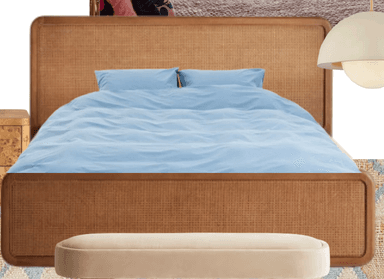 A contemporary platform bed frame constructed from natural wood with woven cane panels on both the headboard and footboard. The frame features rounded edges and is presented with light blue bedding. — 3D model