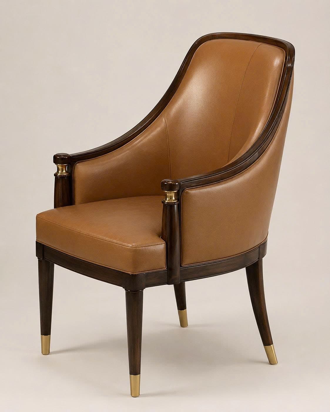 An elegant armchair featuring a curved dark wood frame, light brown leather upholstery, and sophisticated brass accents on the armrests and leg tips. — 3D model