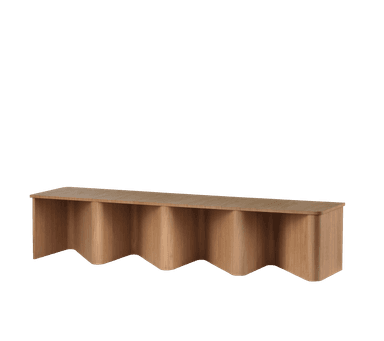 A long, low bench with a light wood finish. The bench features a flat top surface with slightly rounded edges. The base is composed of four vertically oriented, curved panels that create a wave-like or fluted effect. The overall design is minimalist and modern. — 3D model