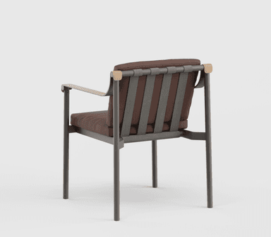 A contemporary armchair featuring a dark gray metal frame, light wood-toned armrests, and plush brown fabric cushions. The design is minimalist, with cylindrical metal legs and a backrest that curves slightly at the top. The seat cushion appears to rest on a webbing support system. — 3D model