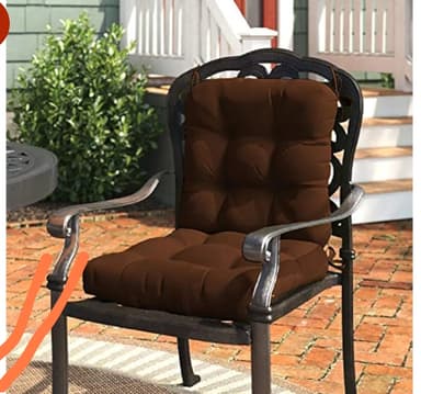 An outdoor patio armchair made of dark-finished cast aluminum, featuring an ornate scrollwork backrest, curved armrests, and dark brown tufted cushions for both the seat and back. — 3D model