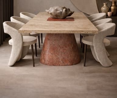 A low-profile coffee table featuring a rectangular, light beige travertine top supported by a conical, reddish-brown marble base. The design is modern and minimalist, highlighting the natural patterns and textures of the stone materials. — 3D model