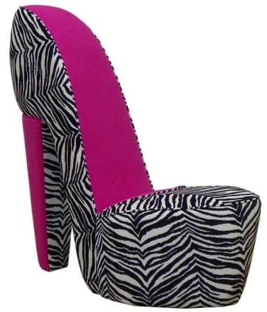A novelty accent chair designed in the shape of a high-heeled shoe, upholstered in a striking black and white zebra print and vibrant fuchsia pink fabric. — 3D model
