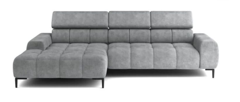 A contemporary sectional sofa featuring a chaise lounge on the left side. The sofa has a modular design with multiple cushions that have a tufted or quilted appearance. The backrests are adjustable or have a multi-piece construction, including a higher headrest section for each seating position. The upholstery appears to be a soft fabric, possibly microfiber or velvet, in a neutral gray tone. It is supported by low-profile, dark-colored legs. — 3D model
