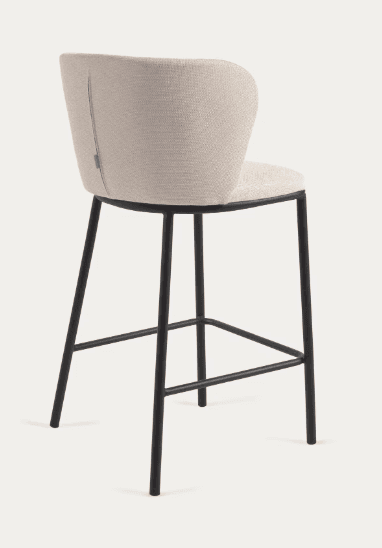 A modern upholstered bar stool with a curved backrest and a black metal frame. The seat and back are covered in a textured, light-colored fabric. The frame consists of four slender legs connected by horizontal supports for stability. — 3D model