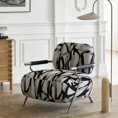 A modern armchair featuring a barrel-style upholstered seat and back, supported by an exposed tubular metal frame that also forms the armrests. The upholstery has a distinctive abstract black, grey, and white pattern. Dimensions are indicated as 71cm (height), 84cm (width), and 81cm (depth). — 3D model