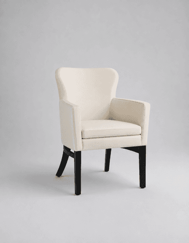 An elegantly designed upholstered dining armchair featuring a high, slightly curved back and padded armrests. The chair is covered in a light, neutral-toned fabric, likely linen or a blend, and stands on four dark, tapered solid wood legs, with the rear legs subtly curved for stability and style. The overall design suggests a contemporary or transitional aesthetic, offering both comfort and sophisticated style. — 3D model