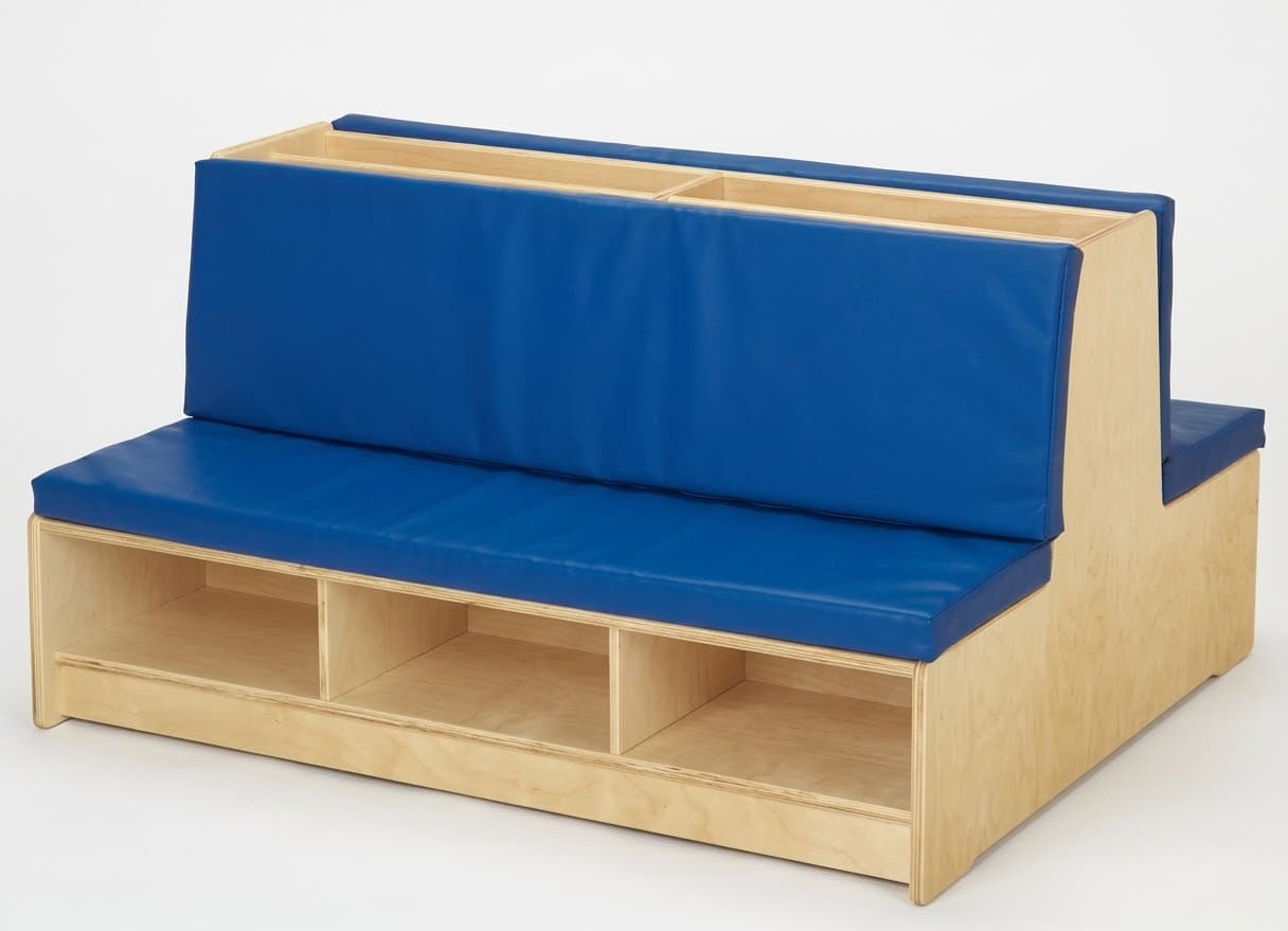 A children's plywood storage bench with bright blue vinyl cushions, featuring open cubbies below the seat and a double-sided backrest with integrated compartments. — 3D model