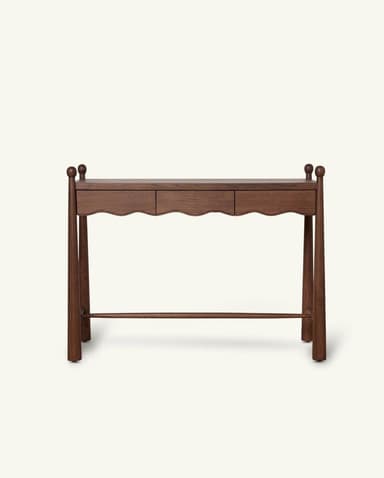 A long and narrow dark brown wooden console table featuring a rectangular top. It includes two drawers with distinctive scalloped front panels. The table is supported by four turned, tapering legs that extend above the tabletop, each topped with a spherical finial. A horizontal stretcher bar connects the legs near the base, providing stability. — 3D model