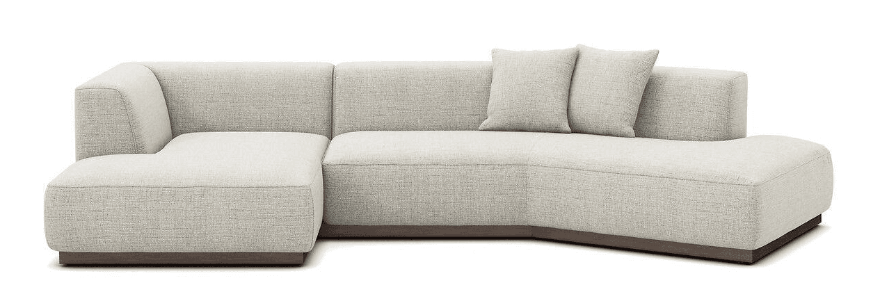 A modular sectional sofa with a low profile and a textured fabric upholstery. The sofa features a chaise lounge on the left, a longer seating section in the middle, and an armrest on the far right. It is supported by a dark wooden base. Two square throw pillows are placed on the backrest of the middle section. — 3D model