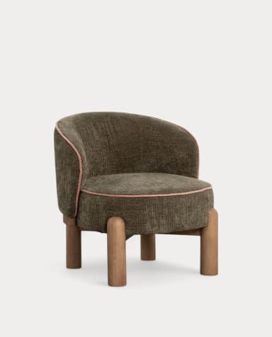 A compact, upholstered accent chair featuring a rounded backrest that flows into integrated arms. The chair is covered in a ribbed, dark green fabric with light pink piping detail along the edges of the back and seat cushion. It stands on four short, cylindrical wooden legs. — 3D model