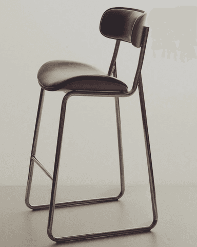 A modern bar stool featuring a bent plywood shell with black upholstered seat and backrest, supported by a sleek tubular metal sled base with an integrated footrest. — 3D model
