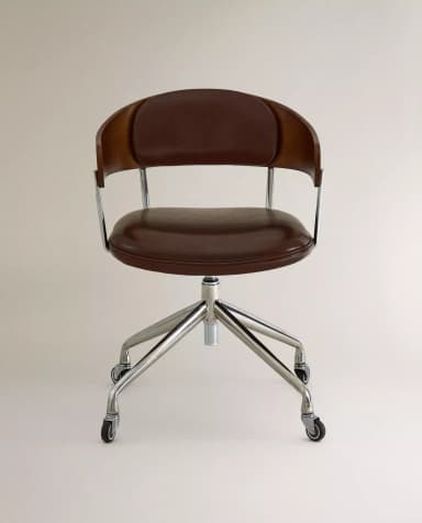 A brown leather upholstered swivel desk chair featuring a bentwood back shell and a five-star chrome caster base. — 3D model