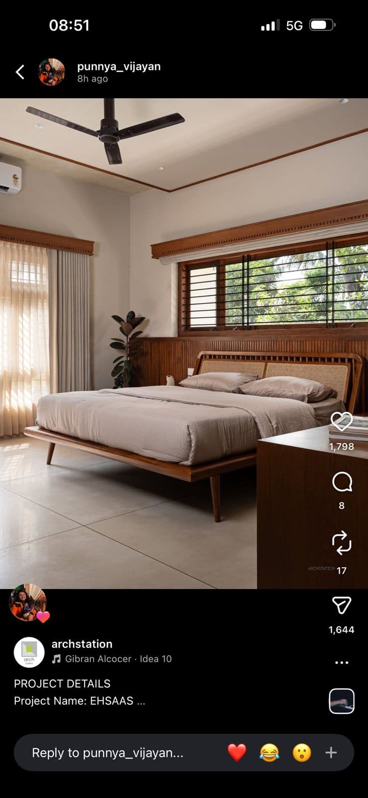 A contemporary platform bed featuring a light-toned wooden frame and a headboard with woven rattan panels, supported by four subtly tapered legs. It is dressed with simple light beige bedding. — 3D model