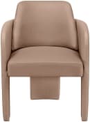 A contemporary armchair with a rounded back and arms, upholstered in a light brown or taupe material. The seat and back appear to be well-padded. The base is a contrasting dark material, possibly metal or wood, with a minimalist, somewhat blocky design that extends slightly forward under the seat. — 3D model