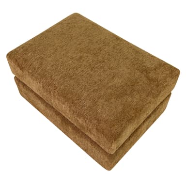 A rectangular upholstered ottoman featuring a textured golden-tan fabric. The design is a solid, block-like form with a slightly recessed base, giving it a sturdy, legless appearance. The upholstery has a subtle vertical pile texture across all visible surfaces. — 3D model