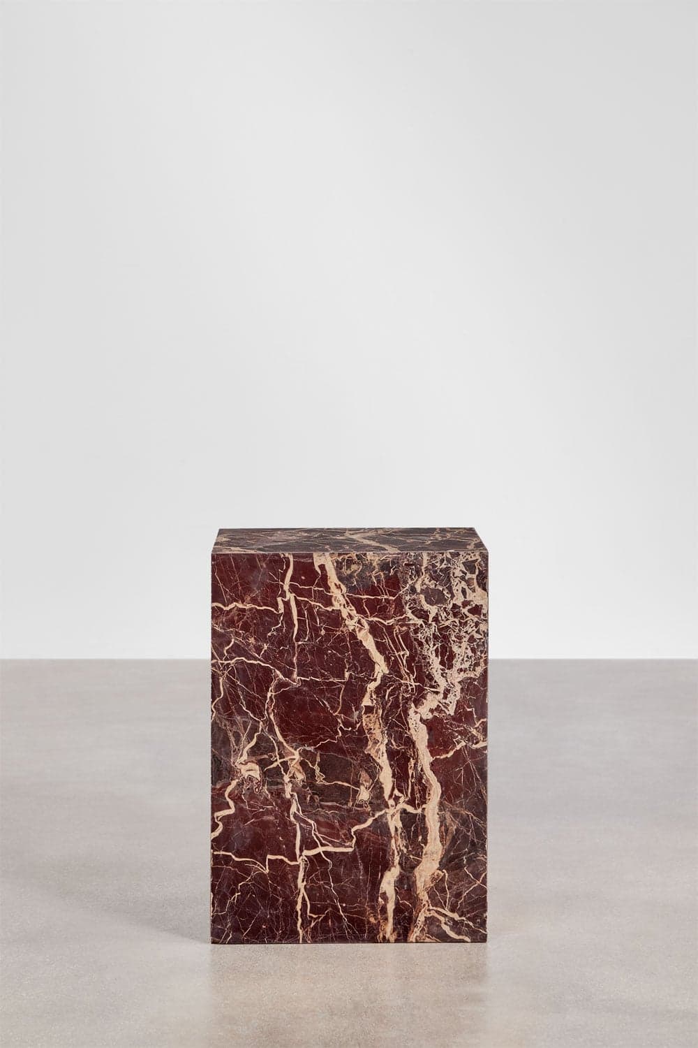 A rectangular pedestal with a block form, crafted from dark red marble featuring intricate white veining. The surface appears polished and smooth. — 3D model