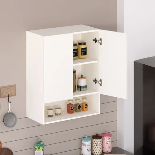 A minimalist, white wall-mounted kitchen cabinet featuring a single hinged door and multiple internal storage compartments. The cabinet is shown with the door partially open, revealing two internal shelves stocked with various jars and cups, suggesting its utility for kitchen organization. — 3D model