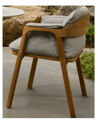 A modern armchair with a wooden frame and upholstered seat and backrest. The frame is constructed from light-colored wood, exhibiting a natural grain. The seat and backrest are covered in a textured, light gray fabric, with padded cushioning for comfort. The armrests are integrated into the wooden frame, continuing the line from the backrest to the front legs. — 3D model