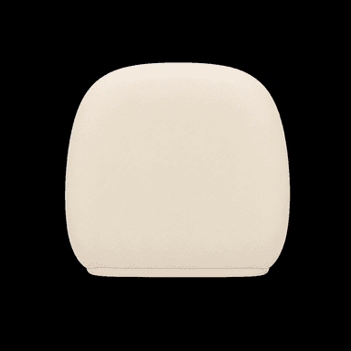 A cream-colored, low-profile armchair with a rounded, bulbous form. The armchair features a single-piece upholstered seat and backrest, creating a seamless, organic silhouette. The base is integrated into the overall rounded design, lacking distinct legs. The overall aesthetic is modern and sculptural. — 3D model