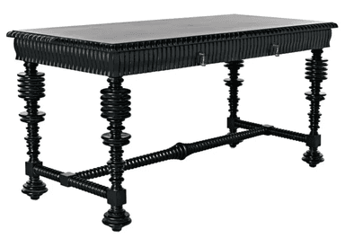 A sculptural black wood desk featuring a rectangular top, a finely fluted or reeded apron with two drawers, and four robust spiral-turned (spool) legs connected by a matching stretcher. The drawers are equipped with small brass ring pull handles. The entire piece is finished in black. — 3D model