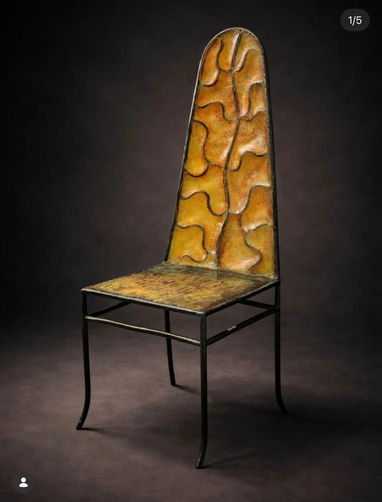 A single, tall-backed chair featuring a dark metal frame and a patinated metal seat and backrest with an organic, branching pattern. — 3D model