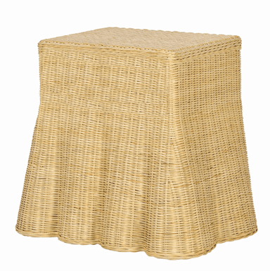 A small, square-topped side table constructed entirely from woven rattan or wicker. The upper section is cuboid, transitioning downwards into a flared base with a scalloped edge. The weaving pattern is a tight, uniform weave throughout the structure. — 3D model