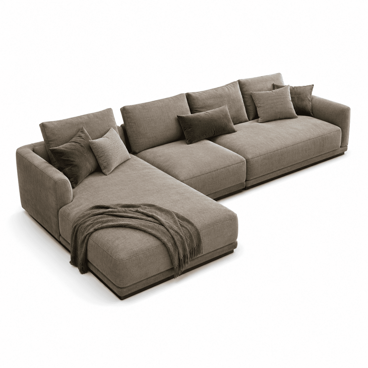 A contemporary L-shaped modular sectional sofa featuring deep seating cushions and a chaise lounge extension, upholstered in a textured light brown fabric. It is adorned with olive green and textured grey throw pillows, and a green knitted throw blanket. — 3D model