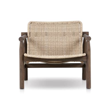 A modern armchair with a wooden frame and a woven rattan seat and back. The armchair features a robust, dark-stained wooden frame with visible grain. The seat and backrest are constructed from tightly woven natural-toned rattan, providing a contrasting texture. The armrests are extensions of the wooden frame, formed by cylindrical wooden pieces. — 3D model