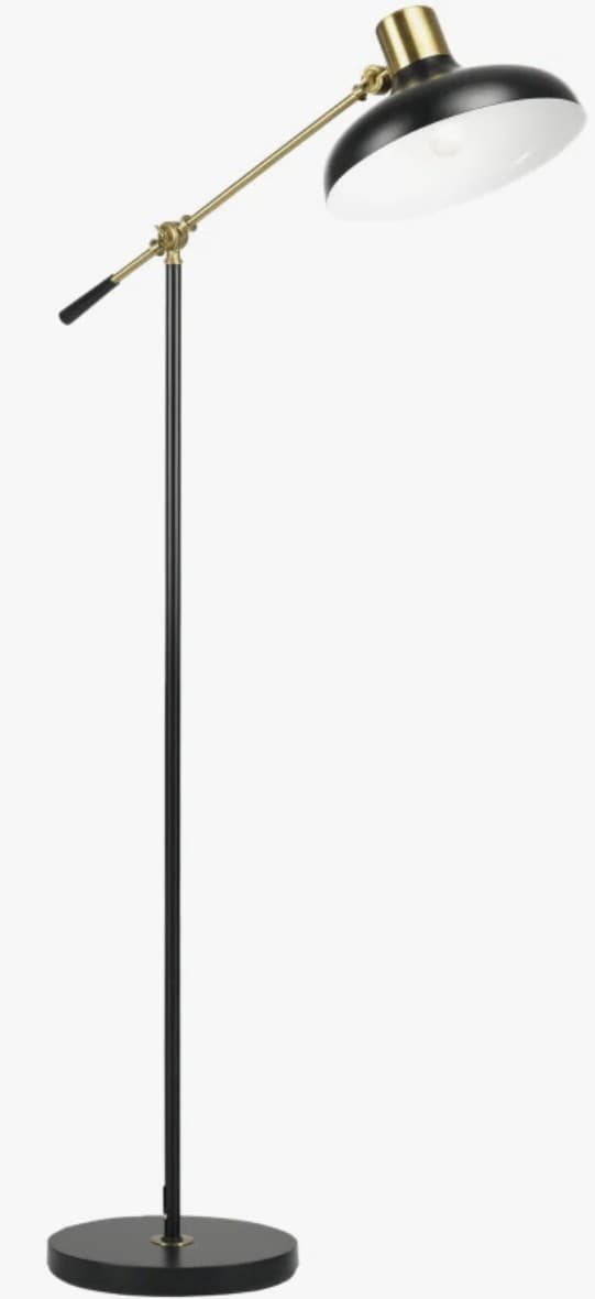 A floor lamp with a black metal circular base, a vertical black metal pole, and an adjustable brass arm supporting a black conical lampshade with a white interior. The lamp has a vintage industrial aesthetic. — 3D model