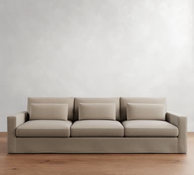 A three-seater sofa with clean lines and square armrests. It features a padded seat and back cushions, with additional lumbar support cushions. The upholstery appears to be a textured fabric. — 3D model