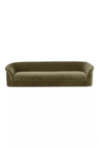 A contemporary three-seater sofa upholstered in a plush olive green velvet fabric, featuring a low-profile design with integrated, gracefully curved arms and backrest. The design emphasizes soft lines and a seamless, monolithic appearance without visible legs. — 3D model