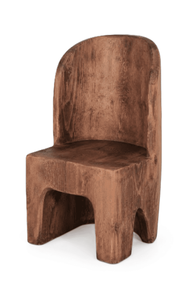 A robust, sculptural chair crafted from solid wood, featuring a dark brown, distressed finish that highlights the natural grain. Its design is minimalist and blocky, with a gently curved backrest and a substantial, integrated base formed by cut-out sections from the main block. The chair has no discernible armrests, contributing to its monolithic appearance. — 3D model