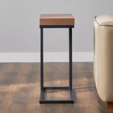 A modern side table with a rectangular, light wood top and a slender, dark metal frame. The frame has an open, C-shaped design with vertical supports and a lower shelf, also made of wood. — 3D model