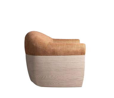 An upholstered barrel back accent chair featuring a curved backrest and integrated armrests. The seating area is entirely upholstered in a light brown, textured fabric, which contrasts with the exposed, light-toned wooden frame that encases the lower part and extends up the sides of the chair. The wooden frame exhibits a visible grain pattern, suggesting a natural wood finish. The design is compact and contemporary. — 3D model