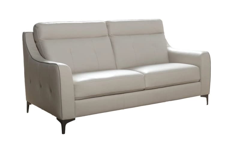 A contemporary two-seater sofa upholstered in light grey leather. It features two distinct seat cushions and two back cushions with integrated headrest-like support. The armrests are slightly flared and have a distinct piping detail, possibly in a darker contrasting color. The side panels of the sofa include subtle button tufting, and it stands on four slender, tapered dark metal legs. — 3D model