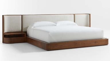 A modern platform bed featuring a dark wood frame, a wide upholstered headboard, and integrated floating nightstands with drawers. — 3D model