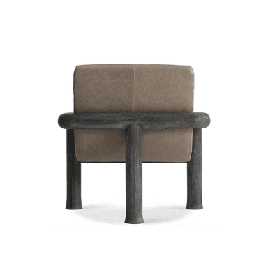 A modern armchair with a distinctive design featuring a curved frame and upholstered seat and back. The frame is constructed from dark, textured wood, contrasting with the light-colored, tufted upholstery. — 3D model